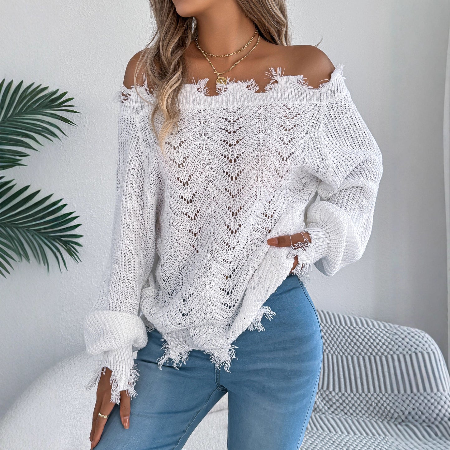 Hollow out long sleeved off shoulder pullover sweater