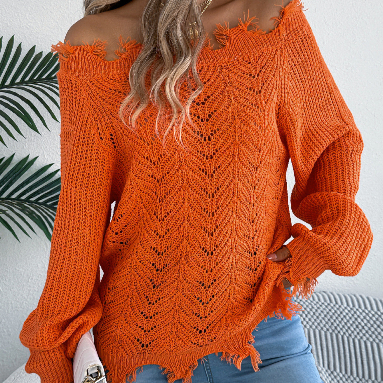Hollow out long sleeved off shoulder pullover sweater